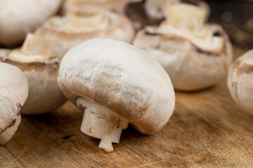 peeled and washed mushrooms while cooking on the table