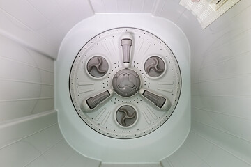 Vertical axis drum automatic washing machine spindle.