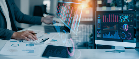 Technology and financial advisory services concept. Business hands working on digital laptop or...
