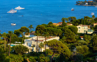 Panoramic view of Saint-Jean-Cap-Ferrat resort town on Cap Ferrat cape at French Riviera of Mediterranean Sea in France