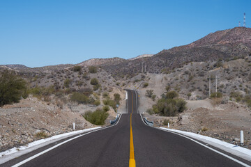 Mountain road among Mexican desert landscape