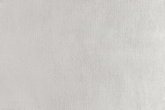 Texture background of white velours fabric. Textile structure, cloth surface, weaving of jacquard material closeup. Upholstery, curtains, backdrop, wallpaper. - Powered by Adobe