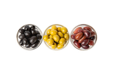 Green, black and red olives isolated on white background. Various types of olives and with fresh olive leaves. Mediterranean food. Vegan.