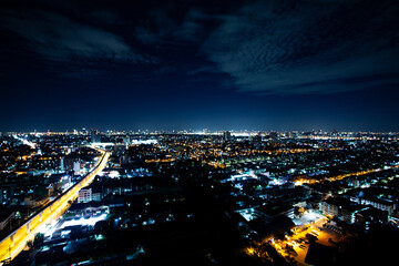 Fototapeta na wymiar Bird's eye view, night view of the city that is beautiful