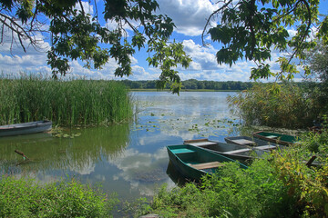 Backwater on the Southern Bug River with moored boats.
