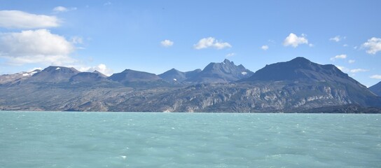 Beautiful mountain landscapes behind Argentina Lake in Patagonia, Argentina