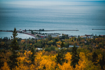 Far view of the Grand Marais town in Minnesota in the fall with a view of Lake Superior