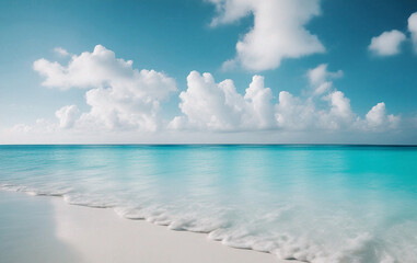 Beautiful sandy beach with white sand and rolling calm wave of turquoise ocean on Sunny day on background