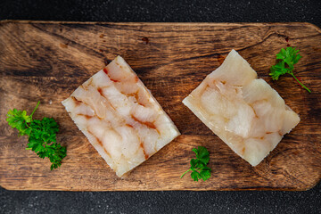 fish briquette raw fillet seafood cooking defrost appetizer meal food snack on the table copy space