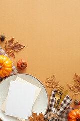 Thanksgiving gathering idea. Top view vertical shot of postcard, plate, cutlery, tablecloth, colorful pumpkins, acorns, dry leaves on pastel brown background with promo spot