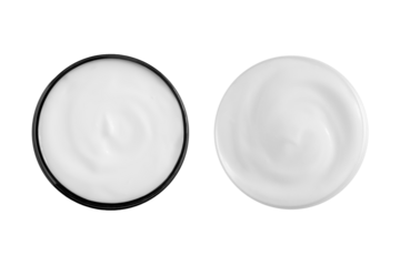 Cream in a black and white jar view from above.