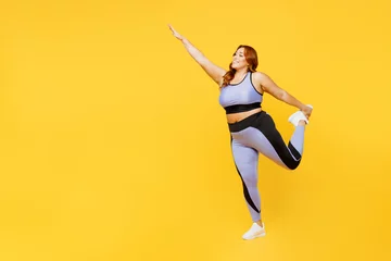Fotobehang Graffiti collage Full body side view young chubby plus size big fat fit woman wear blue top warm up train do stretch exercise for hand and leg isolated on plain yellow background studio home gym Workout sport concept