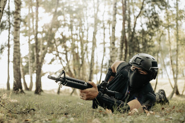 Soldier aiming to the target, and ready to shoot.