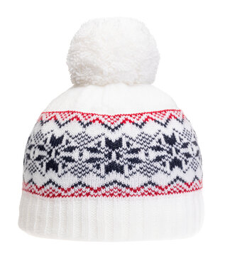White knitted winter bobble hat decorated with Scandinavian geometric ornament. Handmade woolly cap with pompom on top