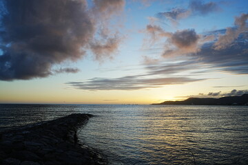Naklejka na ściany i meble Sunset Image of Agarie Beach in Nago, Okinawa, Japan - 日本 沖縄 名護 東江ビーチの夕日