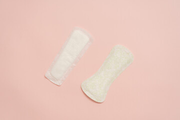 Feminine sanitary napkins (sanitary pads) on pink background