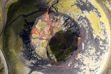Drone View of a volcanic crater on the road to Landmannalaugar called Rainbow Mountains with unique moss and rock patterns in Iceland