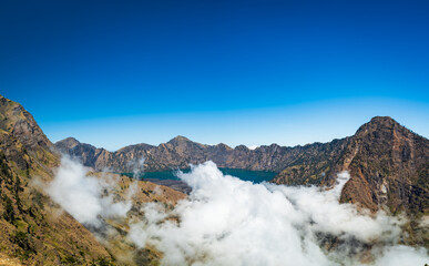 Mount Rinjani crater and lake panorama view, Lombok, Indonesia. Rinjani is the second highest active volcano in Indonesia