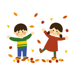 落ち葉で遊ぶ子供達