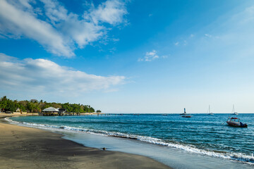 Beautiful landscape of Senggigi beach, Lombok island, scenic travel destination beach with crystal blue waters, Indonesia. 