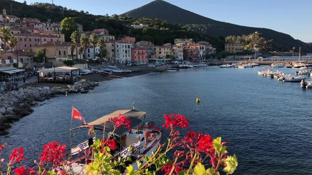Panoramic view of Rio Marina harbor, colorful houses and beach of Elba island, Livorno, Tuscany, Italy.  