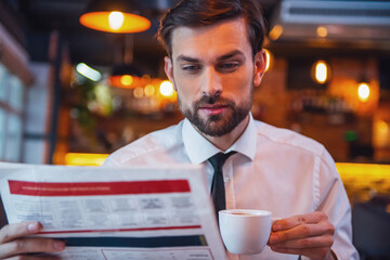 Handsome businessman in cafe
