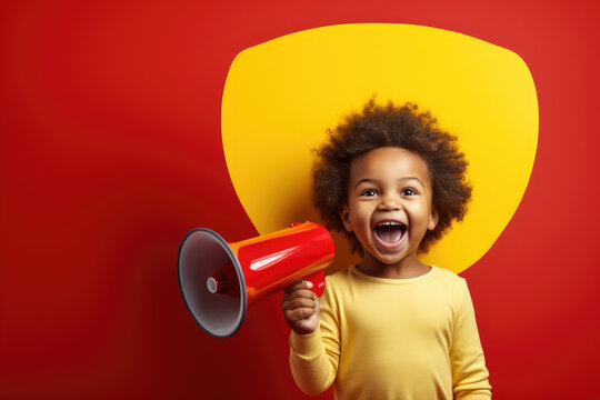 African American child with an Afro hairstyle, eyes and mouth wide open, passionately screaming into a megaphone.