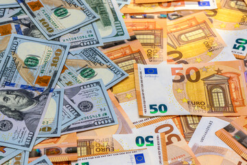 American dollars at 100 and euros at 50 as a background, studio shot 7