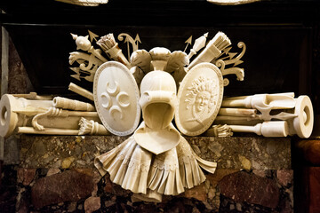 Detail of helmet and shield inside Valletta Cathedral, Malta