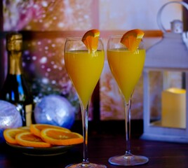 A classic mimosa cocktail made with sparkling wine and orange juice.