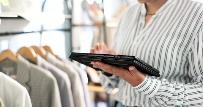 Woman, tablet and hands for clothing rack inspection, inventory or fashion in small business at boutique store. Closeup of creative female person with technology for logistics, design or startup shop