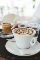 unrecognizable waitress holding a breakfast tray at a coffee shop