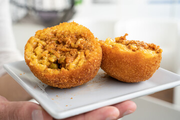 Fried rice ball. Arancino Arancina Arancini - Sicilian Street Food 