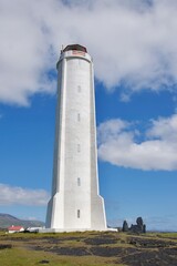 Fototapeta na wymiar Lighthouse at Arnarstapi coast in Snaefellsnes Peninsula, Iceland