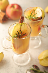 Warm apple autumn drink with cinnamon	
