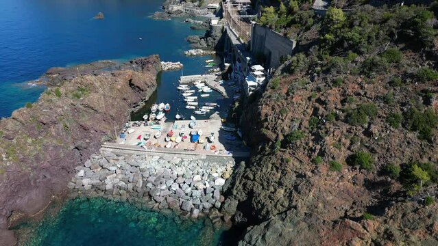 Europe, Italy, Framura is a little sea village in Liguria close to 5 terre ( five island )  - drone aerial view of mediterranean coast - natural harbour and beach 