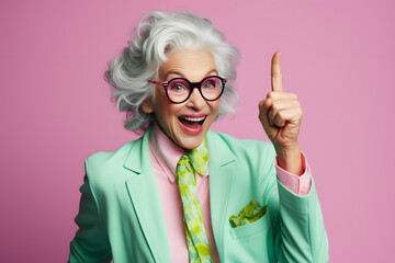Elderly woman showing hand pointing gesture