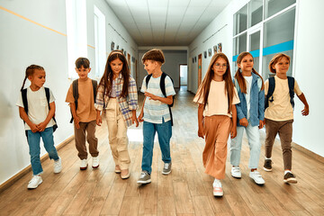 Fototapeta premium Children learning in a school classroom