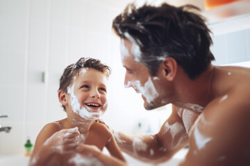 Son shaving with father in the bathroom