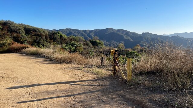 Open gate leading to the Temescal Ridge Fire road in the Santa Monica mountains of topanga or Los Angeles, California.