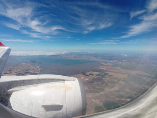 View at portugal from above through a plane window