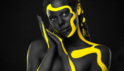African black and yellow art on the models face. Download high resolution picture for music cover.