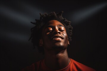 Outdoor portrait photography of a black man, happy and smiling