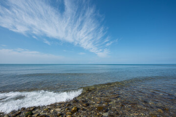 Seashore, pebbles. Calm. Nebug area. Black Sea.