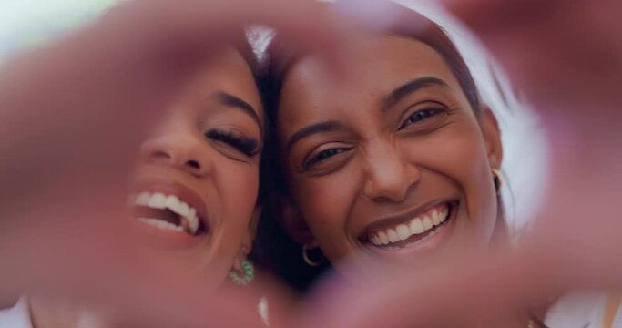 Women, selfie and heart hands by face, smile and happy for lgbtq pride with sign language, symbol or icon for love. Girl, photography and couple of friends in portrait, memory and social media post