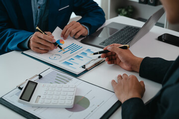 A team of young entrepreneurs and Asian startups held a business meeting. to achieve the marketing...