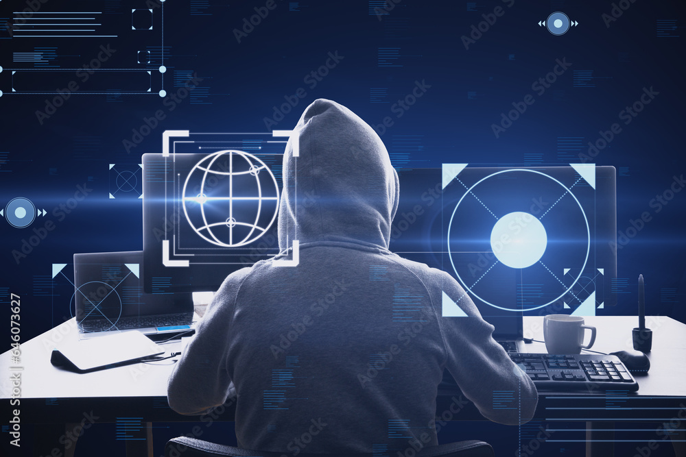 Aufkleber Back view of hacker at desk using computers with creative hacking interface on dark background. Code window high tech UI and spyware concept.