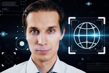 Portrait of attractive young european businessman with creative hacking interface on dark...