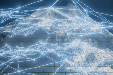 Glowing polygonal mesh on bright city background. Smart city concept. Double exposure.