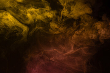 Yellow and pink steam on a black background.